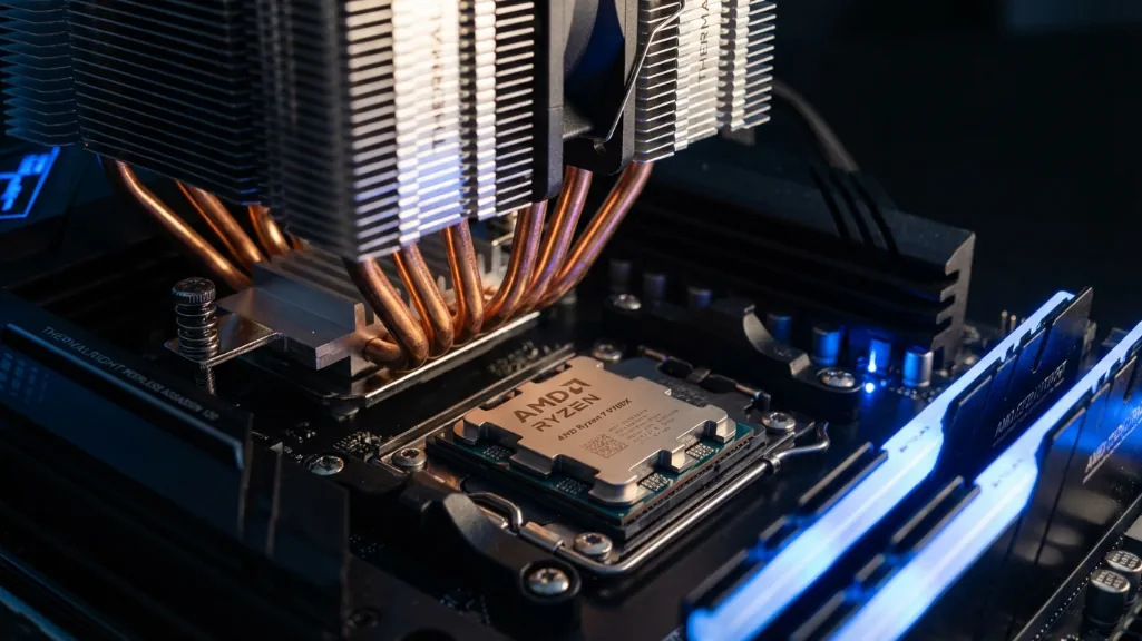 AMD Ryzen 7 9700X CPU with Thermalright Peerless Assassin 120 air cooler installed on AM5 motherboard