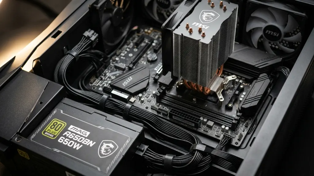 Close-up of MSI prebuilt power supply showing 80 Plus Bronze certification and OEM cooling components