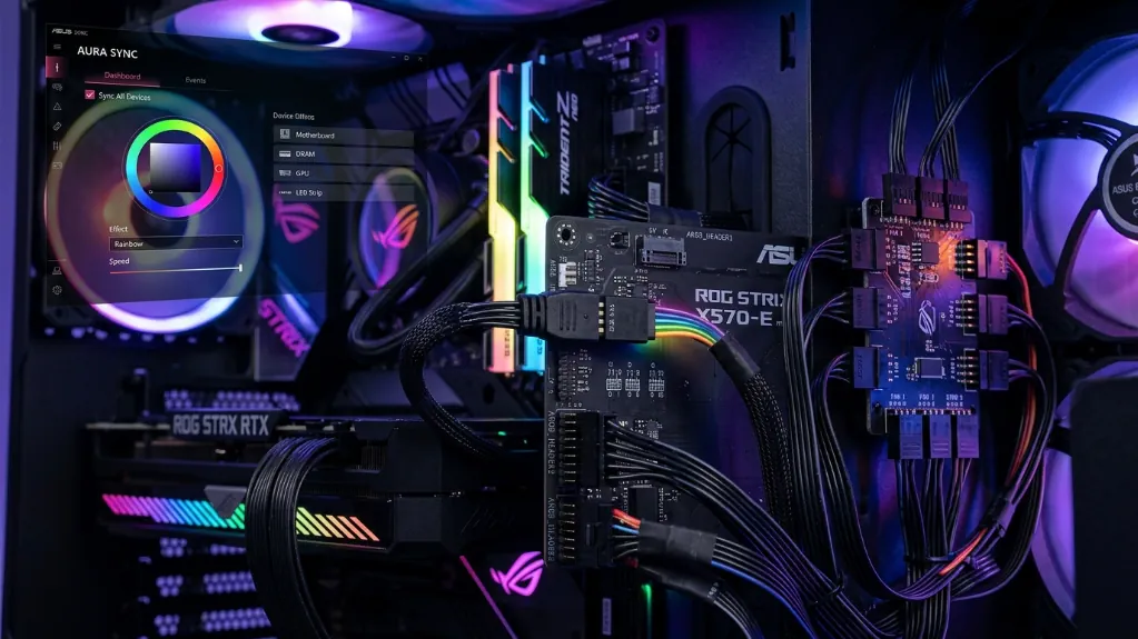 Motherboard ARGB header close-up with multiple RGB fan and LED strip connections, showing synchronized lighting