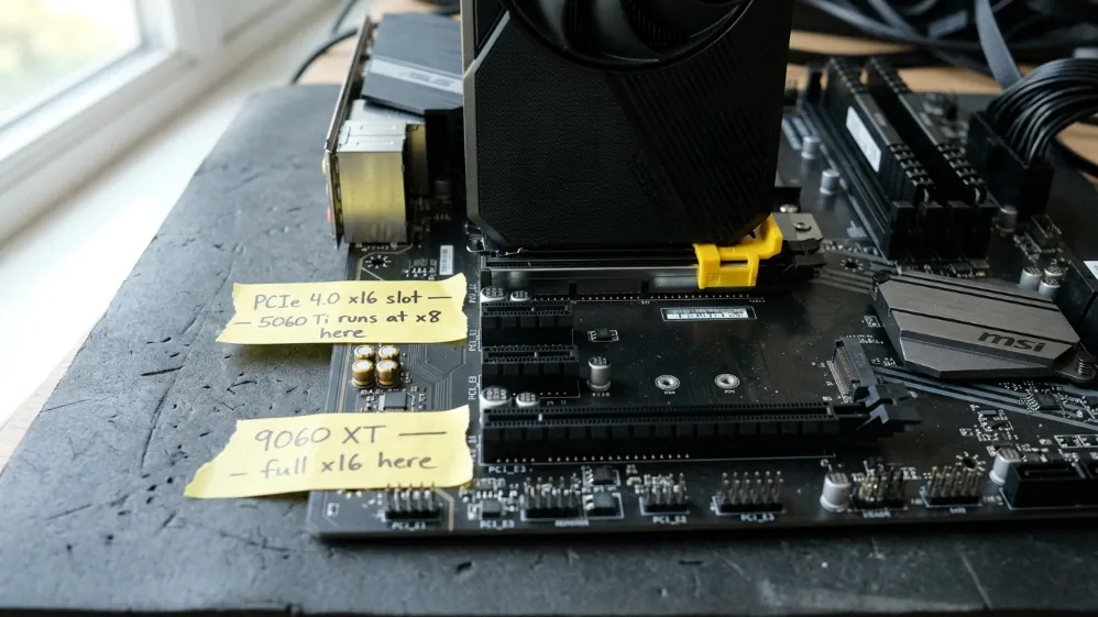 RTX 5060 Ti installed in PCIe 4.0 x16 motherboard slot showing bandwidth limitation annotation versus full x16 available for RX 9060 XT
